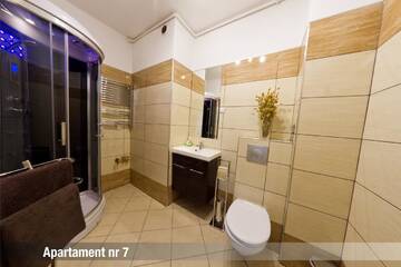 Фото номера Люкс с 1 спальней и диваном-кроватью Апарт-отели Apartamenty Katowice г. Бытом 7
