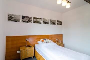 Фото номера Апартаменты (для 3 взрослых) Апартаменты Stara Piekarnia г. Бытом 2