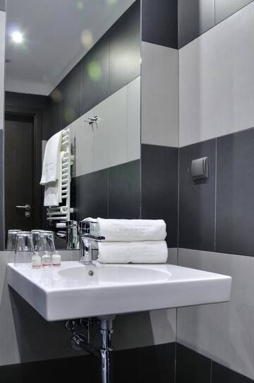 Фото номера Двухместный номер с 2 отдельными кроватями Отель Hotel PRIME - Spa &amp; Wellness г. Бытом 6