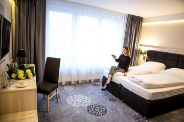 Фото номера Улучшенный двухместный номер с 1 кроватью Отель Hotel Lantier г. Бытом 18