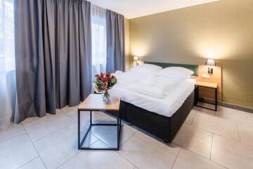 Фото номера Улучшенный двухместный номер с 1 кроватью Отель Hotel Lantier г. Бытом 14
