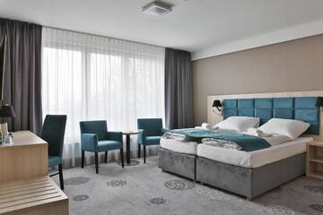 Фото номера Двухместный номер Делюкс с 1 кроватью и ванной Отель Hotel Lantier г. Бытом 3